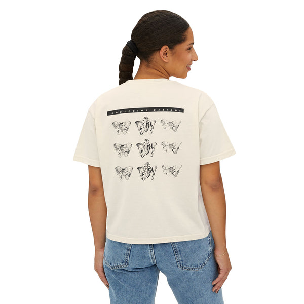 Model wearing the 1991 Tee — Boxy Cropped in cream, back view showing the 1991 archive print
