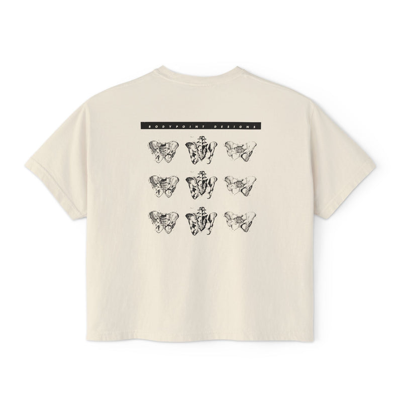 The 1991 Tee — Boxy Cropped in cream, back view: repeating grid of pelvis artwork from Bodypoint’s 1991 first catalog