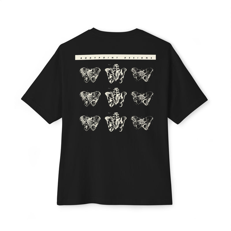 The 1991 Tee — Unisex Boxy in black, back view: repeating grid of pelvis artwork from Bodypoint’s 1991 first catalog